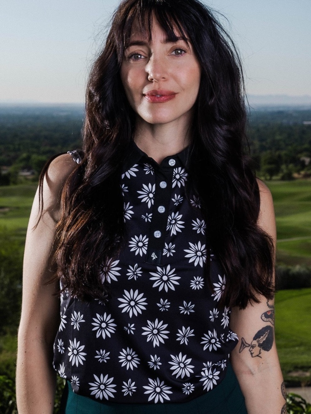 NWOT BYRDGANG Women's Sleeveless black and white flower Golf Polo